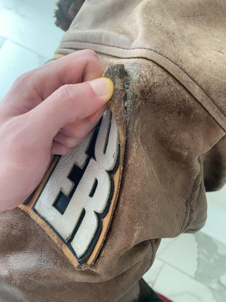 removing patch from leather jacket