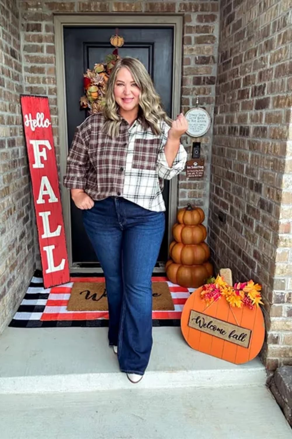 Exemplifying a casual yet chic autumn style, this outfit showcases a classic fall aesthetic with a plaid shirt paired with dark jeans, offering a timeless appeal within a versatile and seasonal neutral color palette.