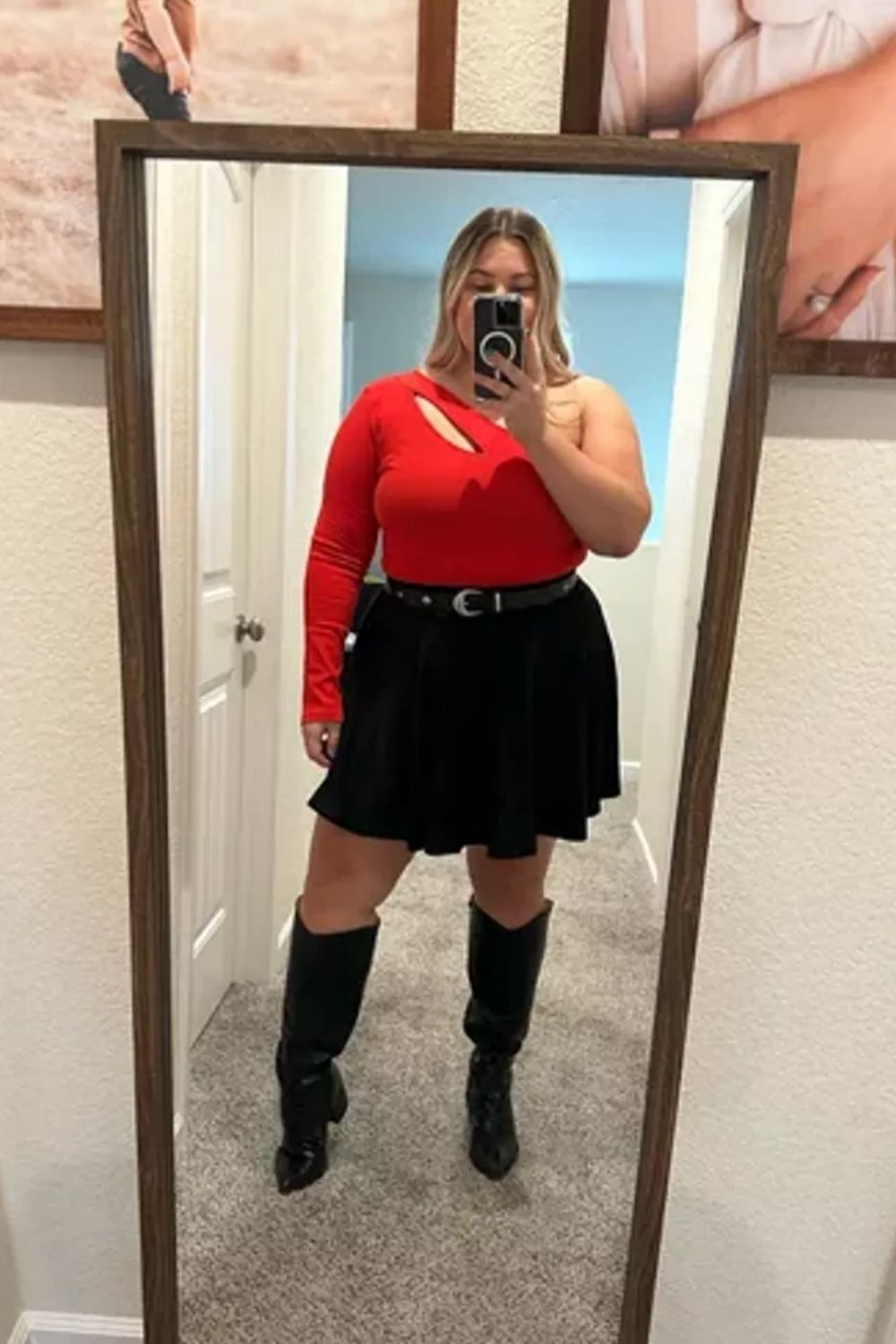 Bold red top, high-waisted black skirt, knee-high boots for a confident look.