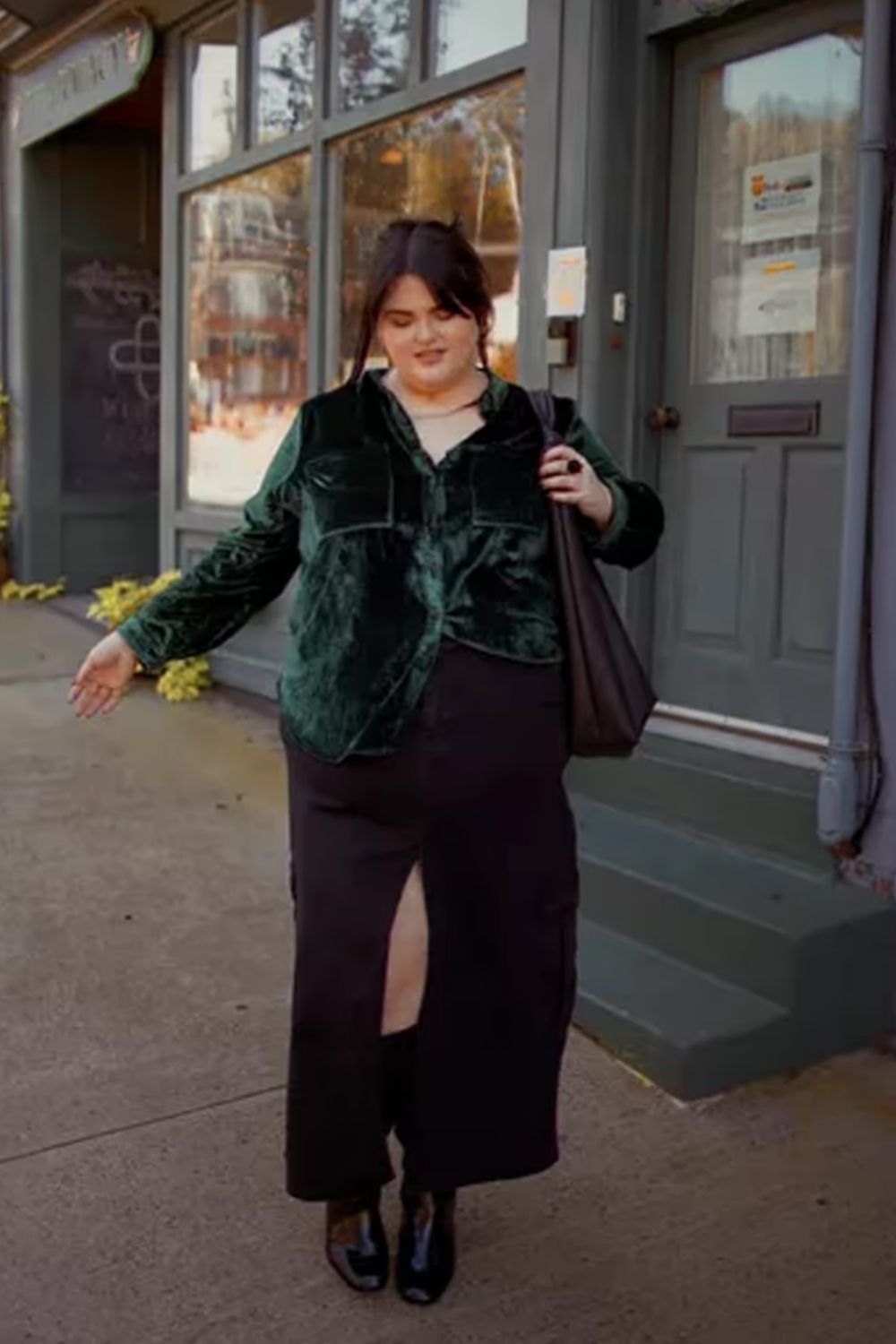 This ensemble strikes a balance with a textured green jacket, wide-leg pants, and a fitted top, offering a trendy yet sophisticated silhouette.